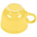 A Fiesta sunflower yellow china cup with a handle.