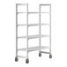 A white plastic Cambro Camshelving Premium mobile shelving unit with wheels.