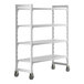 A white Cambro Camshelving Premium mobile shelving unit with vented shelves on wheels.