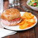 A sandwich on a GET Urban Mill irregular round coupe plate.
