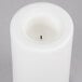 A white Sterno flameless outdoor banquet pillar candle.