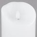 A white Sterno Mirage flameless LED candle.