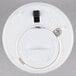A white circular Sterno flameless wax votive.