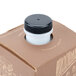 A white carafe in a brown box with a black lid.