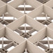 A beige Vollrath Traex glass rack grid with squares.