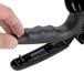 A hand holding a Tablecraft Tritan dispenser with a black handle.