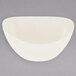 A white GET Osslo melamine bowl on a gray surface.