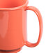 A case of 24 orange GET Rio Orange plastic two handle mugs.