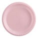 A close-up of a pink plastic plate with a white border.