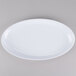 A white oval GET Osslo melamine platter.