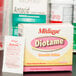 A box of 24 Medique Diotame tablets on a table.