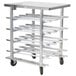 A Regency stainless steel mobile can rack with six shelves on wheels.