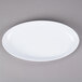 A white oval GET Osslo melamine platter.