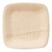 A close up of a square Bambu wooden plate with a wood grain pattern.