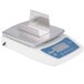 An Edlund digital portion scale with a stainless steel tray.