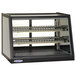 A black and silver Federal Industries heated countertop display case with a glass door.