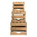 A stack of natural wood chalkboard crate risers with handles.