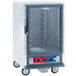A Metro C5 1 Series non-insulated heated proofing and holding cabinet with wheels and a clear glass door.