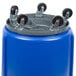 A blue barrel with black wheels.