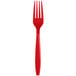 A red plastic fork on a white background.