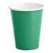 A green paper cup with a white rim.