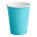 A Bermuda Blue paper cup with a white rim.