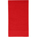 A red rectangular guest towel with a white border.