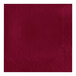 A red Creative Converting luncheon napkin with a square border.