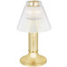 A gold Sterno Paige table lamp with a clear shade.