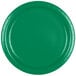 A close-up of a Creative Converting emerald green paper plate with a white border.