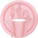 A Classic Pink paper plate with a fork and spoon on it.