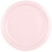 A close-up of a pink paper plate with a white background.