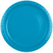 A close-up of a turquoise blue paper plate.