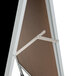 An Aarco aluminum narrow A-frame sidewalk board with a black porcelain marker board.