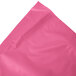 A pink plastic sheet on a white background.