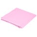 A folded pink Creative Converting table cover on a white background.