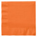 A Creative Converting sunkissed orange paper napkin with a folded edge.