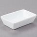 A white rectangular Libbey porcelain sauce bowl.