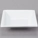 A white square Libbey porcelain bowl.