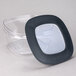 A Rubbermaid clear plastic storage container with a black lid.