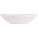 An ivory china monkey dish with an embossed rim.