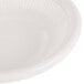 An Ivory (American White) china monkey dish with an embossed rim.