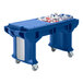 A blue plastic Cambro Versa work table with heavy duty casters.