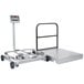 A grey Tor Rey digital receiving bench scale with black wheels.