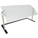 An Advance Tabco portable food shield with a clear screen and black metal poles.