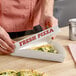 A white clay coated clamshell pizza slice box labeled 'Fresh Pizza' holding a single slice of pizza.
