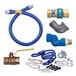 A blue Dormont gas connector kit with fittings and a restraining cable.