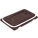 A dark brown plastic rectangular lid with white trim.