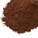 A pile of Ghirardelli Majestic Dutch Cocoa Powder on a white background.