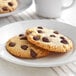 A plate of Ghirardelli dark chocolate chip cookies.